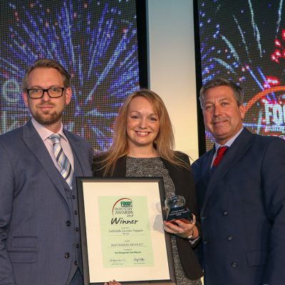 BEST BAKERY PRODUCT: Lichfields Granola Flapjack - Booker L-R: Category partner Richard Watson of Reiser, award winner Sarah Miller of Booker and chef John Torode.