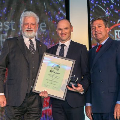 BEST FREE FROM PRODUCT: debbie&andrew's Frozen Perfect Pork Sausages – ABP Wessex L-R: Category partner Bill Jermey of ftc with award winner Simon Young of ABP Wessex and chef John Torode.