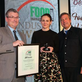 Best Dairy Product Award, Winner: Specially Selected Vintage 25 Month Crunchy Cheddar - L-R: Category partner John Durrant of Bizerba UK Ltd with award winner Geri Sherwin of Aldi UK and host John Torode.
